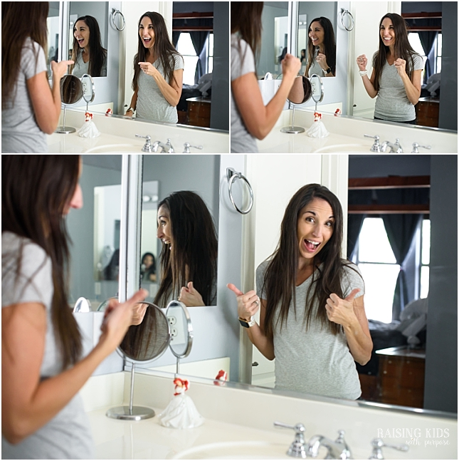 woman looking in mirror part of self care