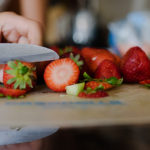 cutting strawberries
