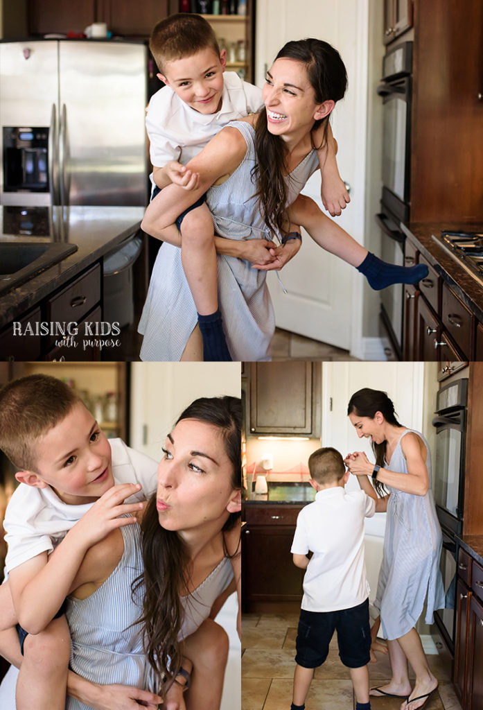 mom and son dancing in kitchen spending quality time together