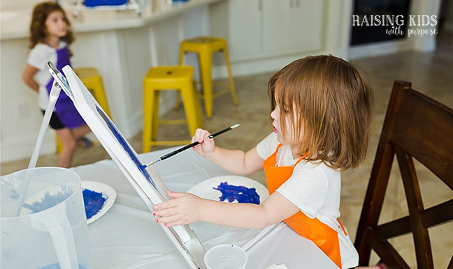 toddler getting creative painting