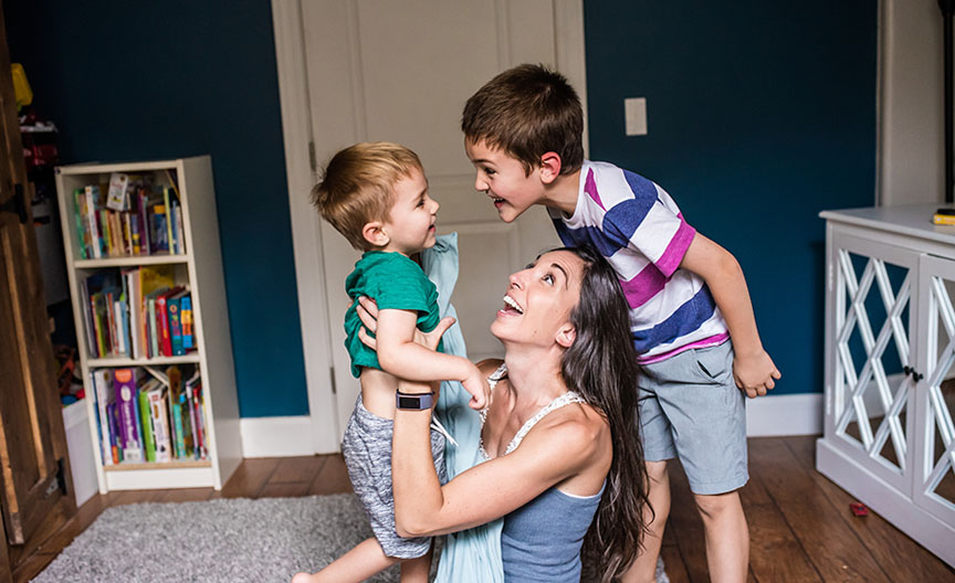 mom and boys in bedroom