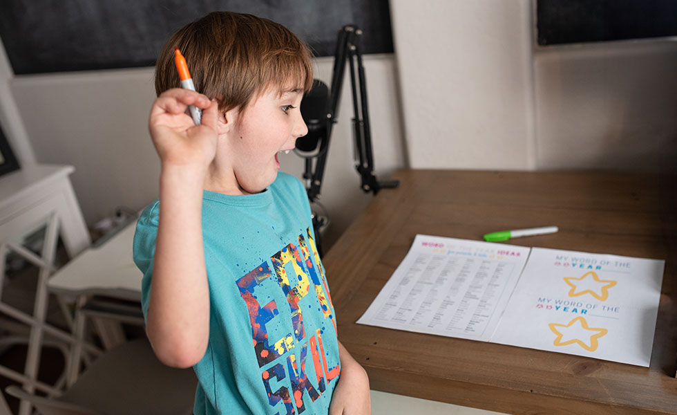 little boy excited to pick his word