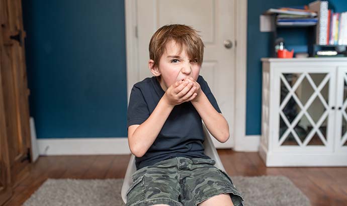 boy eating cheerios