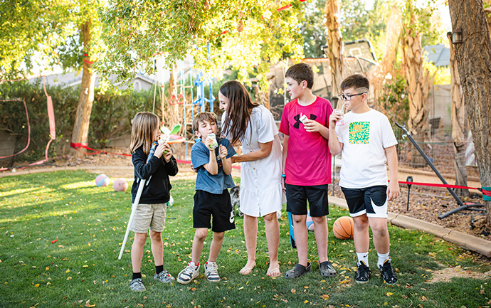 mom and boys sharing tips for summer