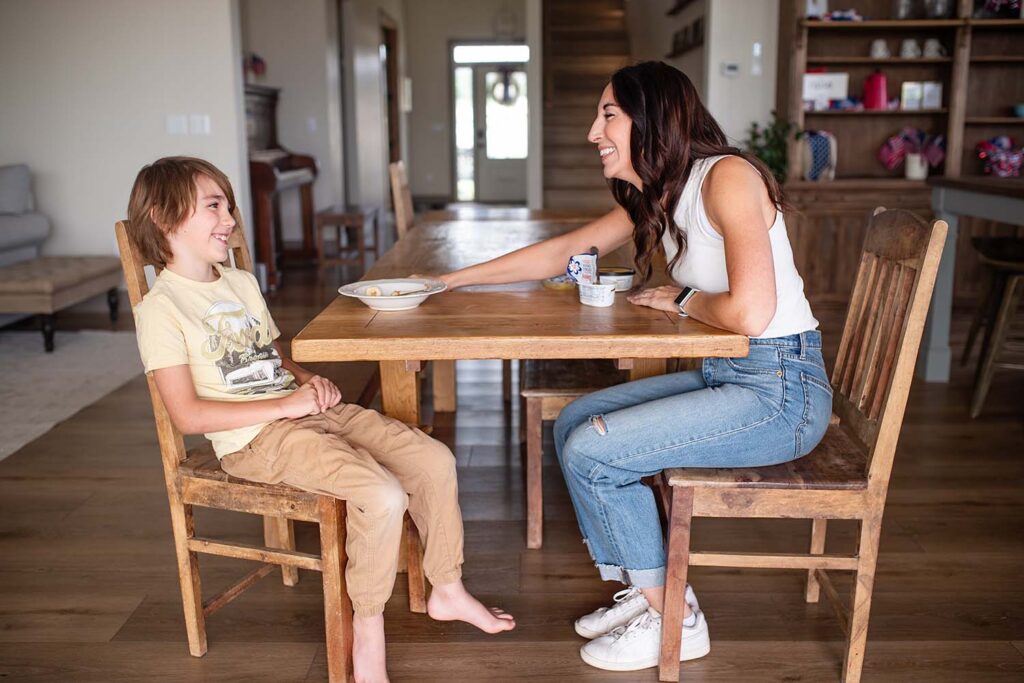 mom and son holding hands