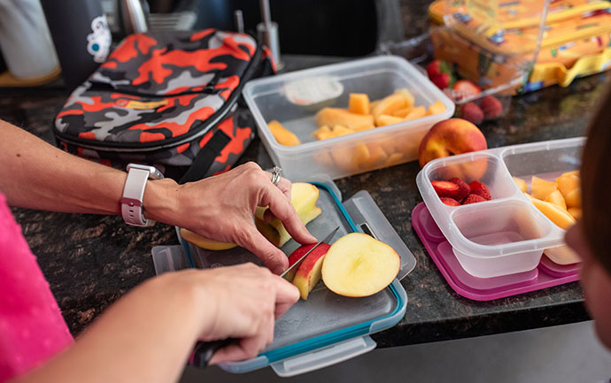 cutting apples for school lunch