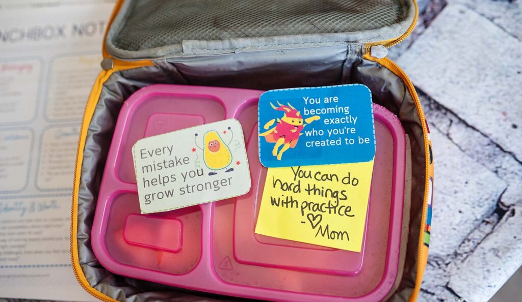 positive school lunch notes on a sticky note and free printable
