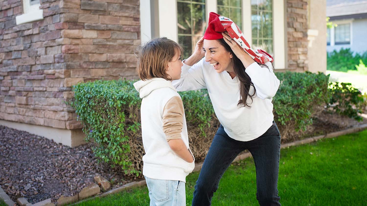 mom using play-based strategies with stocking for son's hard behaviors